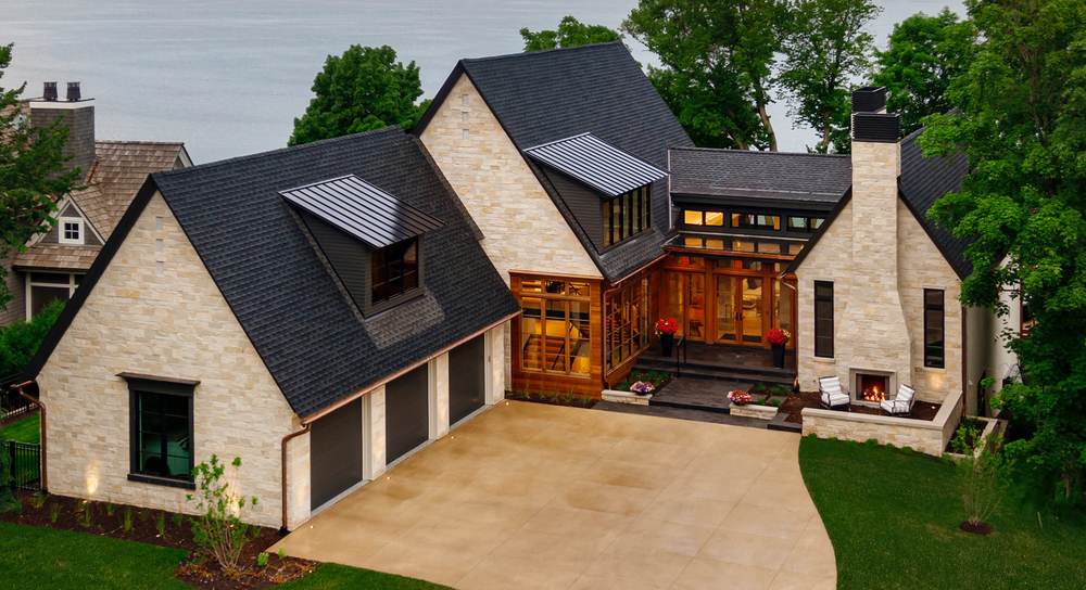 Standing seam steel roofs with copper gutters