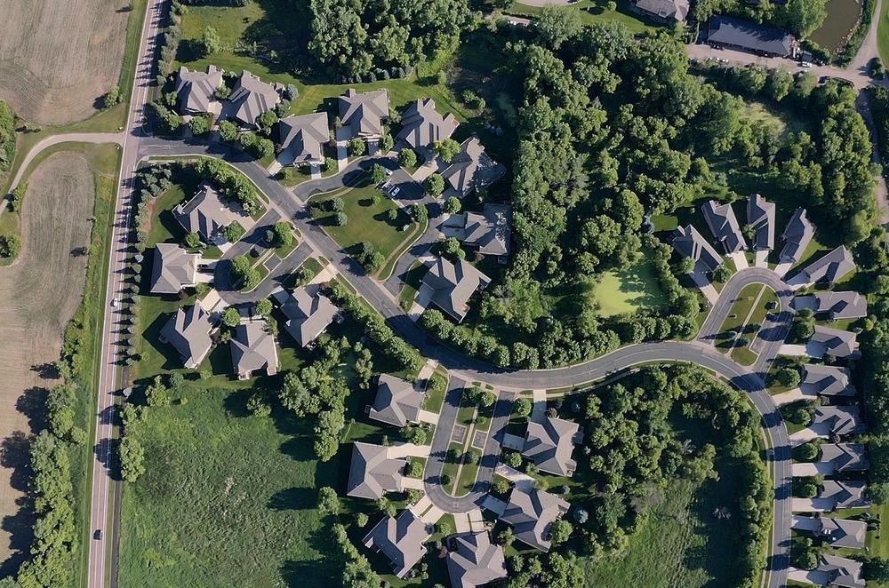 Top-down aerial overview of an association roof replacement