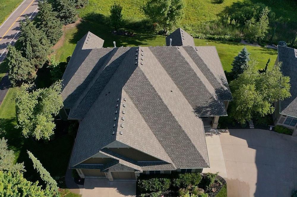 Roof close-up with ridge vent and new shingles