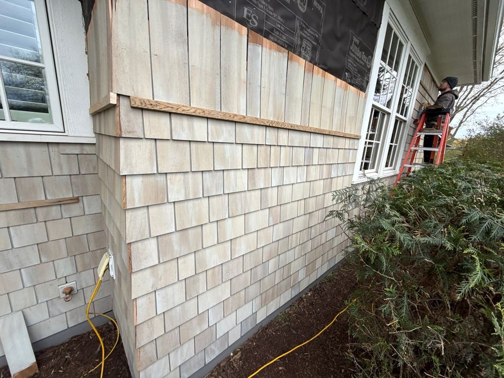 Hand-dipped cedar shingle siding installation — NLR project